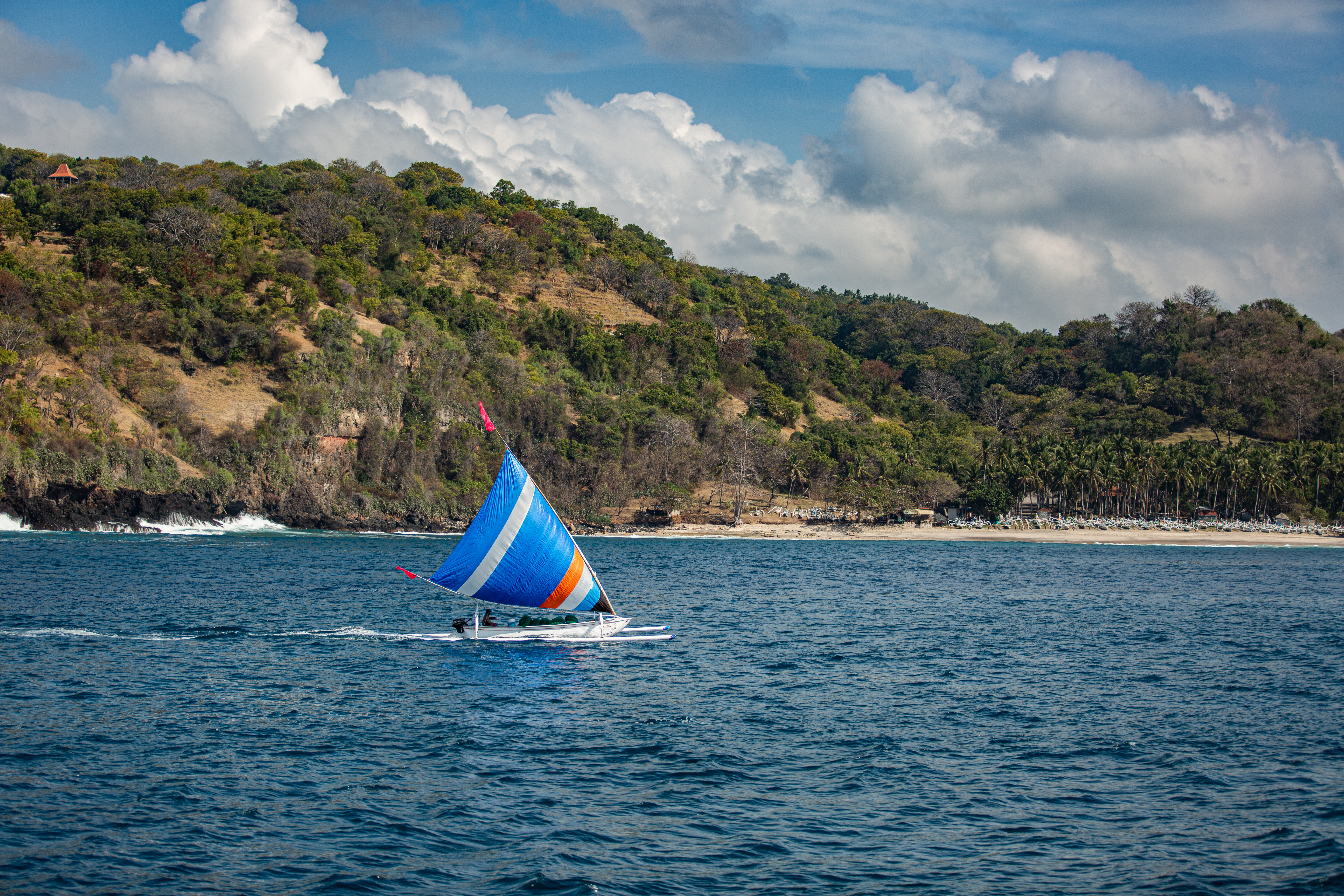 Photograph of sail boat on water